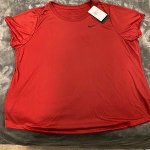 Nike Woman’s 2x Dri-Fit athletic shirts with tag never worn.